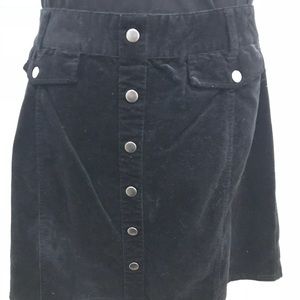 Black corduroy swing skirt with silver buttons